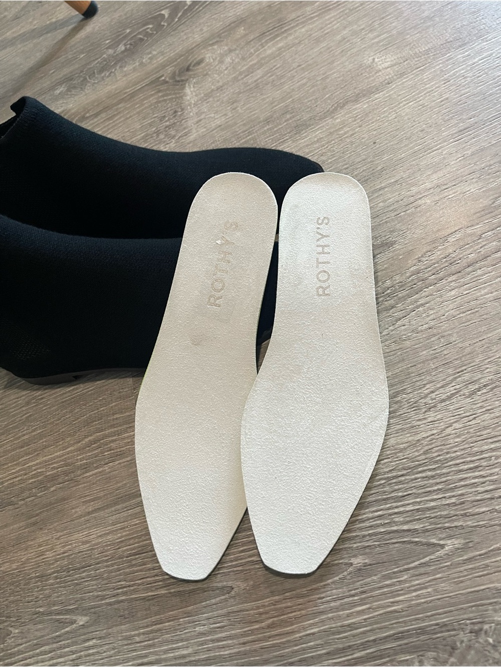 Rothy’s Merino Ankle Boots in onyx black with a distinctive blue pull tab - Picture 6 of 13